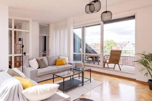 Wohnbereich - Helle und großzügige Dachgeschosswohnung mit Dachterrasse und freiem Blick nach Westen