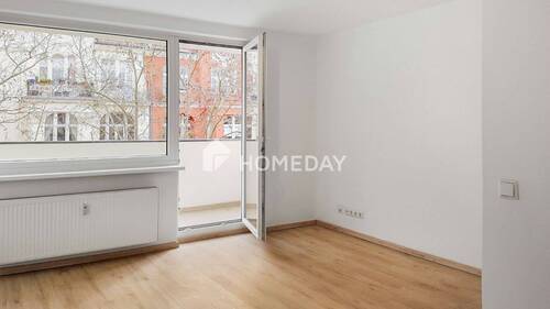 Wohnzimmer 1 - 1-Zimmer-Apartment mit Balkon in urbaner und gefragter Lage