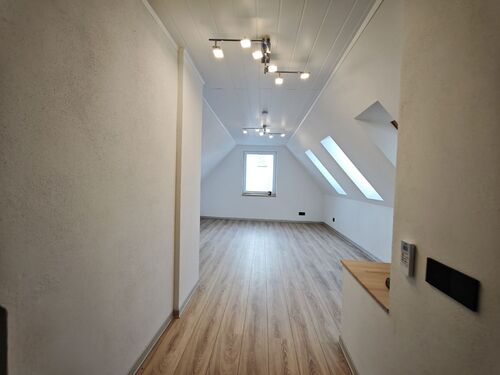 Wohnzimmer - Etagenwohnung mit 55,86 m&sup2; in Tiefenbronn zur Miete