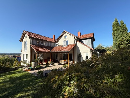 Ansicht vom Garten - Einfamilienhaus mit 234,00 m&sup2; in Wertheim zum Kaufen