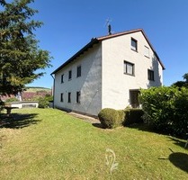 Wohnen und Vermieten in Zell am Main – großzügiges Zwei- bis Dreifamilienhaus mit Garten