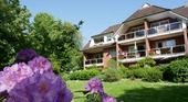 Rückansicht aufs Haus - Wunderschöne Terrassenwohnung in ruhiger und beliebter Wohnlage von Eutin zu verkaufen