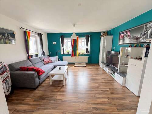 Wohnzimmer - 7 Zimmer Einfamilienhaus zum Kaufen in Wehrheim