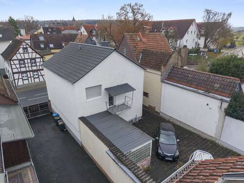 Außenansicht hinten - Einfamilienhaus mit 100,00 m&sup2; in Schöneck-Büdesheim zum Kaufen