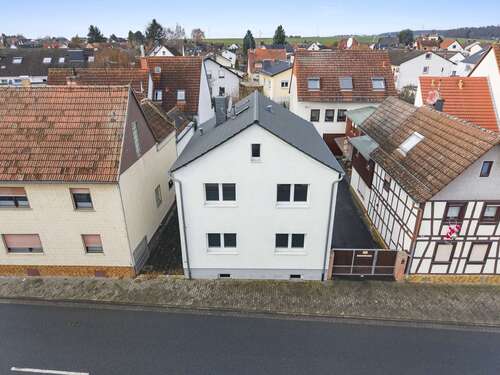 Außenansicht vorne - 4 Zimmer Einfamilienhaus zum Kaufen in Schöneck-Büdesheim