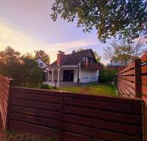Ein Familienhaus mit Wintergarten, Vollkeller und zwei Terassen - Klein Nordende