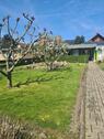 Foto - Kleingarten mit Kamin, Bad und Terrasse