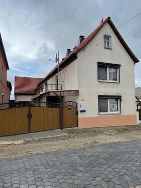 Foto - EF-Wohnhaus m. Nebengebäude und Garten