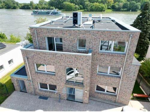 Foto - Neubau 2,5-Zimmer Souterrain-Wohnung, erste Rheinlage in Widdig