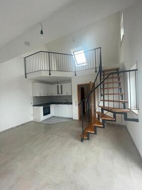 Foto - Galeriewohnung mit Balkon & Tiefgaragenstellplatz - Zentrale Lage