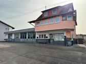 Foto - Haus mit Werkstatt oder Lagerhalle