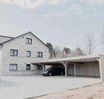 Stilvolle 2-Zimmer-Erdgeschosswohnung mit Terrasse und Keller - Großenaspe