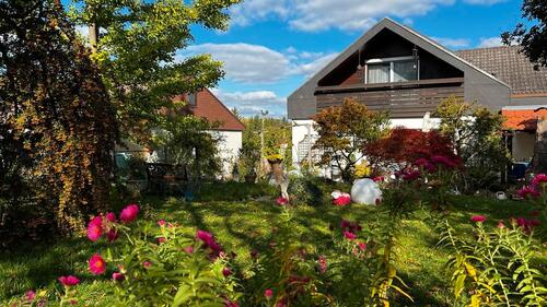 Foto - Einfamilienhaus mit Einliegerwohnung