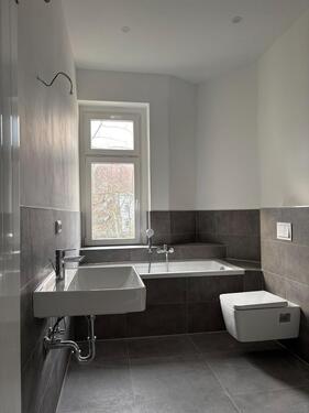 Foto - Moderne 2-Zimmer-Wohnung in zentraler Lage mit Garten und Keller–