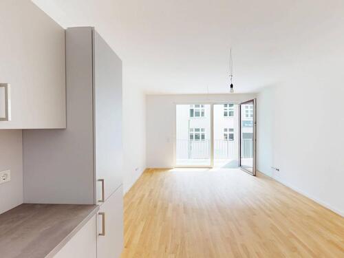 Foto - FAMILIENTRAUM: 4-Zimmer-Wohnung mit 2 Balkonen und EBK im Neubauquartier 'RIEKE'