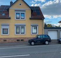 Sanierte 4-Zimmer-Wohnung mit Garten und PV-Strom in Homburg