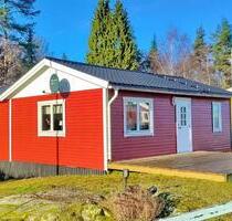 Rot-weißes Ferienhaus 