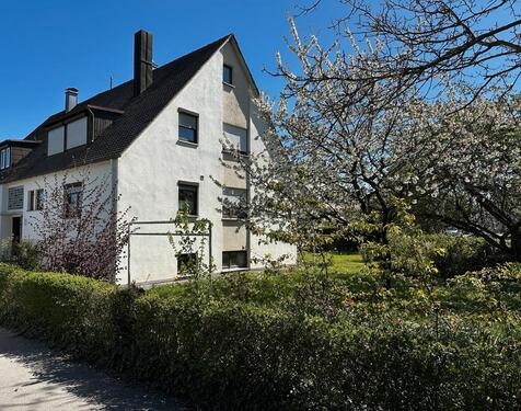 Foto - Doppelhaushälfte (Zweifamilienhaus) mit Garagenanteil