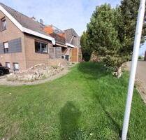 Geschmackvolle EG-Wohnung,zwei Zimmern, Terasse und Einbauküche - Beidenfleth