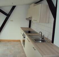 Modernisierte 3-Zimmer-DG-Wohnung mit Balkon und EBK in Lübeck - Trappenkamp