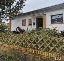 Verkauf Grundstück mit sanierungsbdürftigem Bungalow in Lauenau