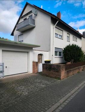 Foto - 3 Zimmerwohnung mit Balkon, Gartenanteil und Garage.