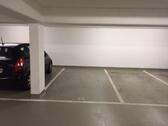 Foto - Tief- Garagenstellplatz mit elektrischem Rolltor