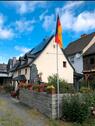 Foto - Einfamilienhaus mit einer massiv gebauten Scheune und Terrasse