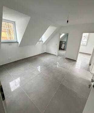 Foto - Erstbezug 2x 3‑ZKB DG 