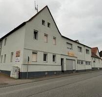 Wohnimmobilie mit 3 Wohneinheiten & Ladengeschäft - Ober-Mörlen