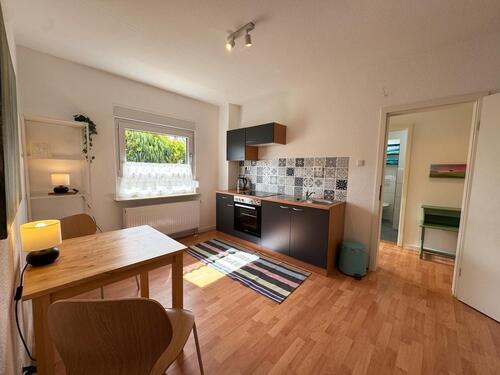 Foto - möblierte Wohnung mit Sitzecke im Grünen