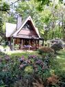 Foto - Wochenendhaus Holzhaus in Winkelform