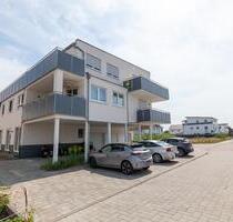 DIETZ: NEUBAU 3-Zimmer-Wohnung im 2. Obergeschoss mit herrlichem Weitblick - Feldrandlage! - Münster (Hessen)