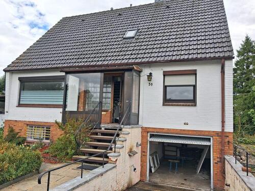 Foto - Vollunterkellertes Einfamilienhaus mit Ausbaupotential