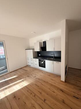 Foto - Neubau-Highlight: Helle 2-Zi.-Wohnung mit Einbauküche + Carport