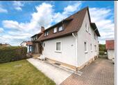 Foto - Einfamilienhaus mit Garten und Garage