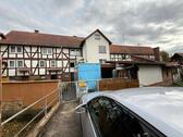 Foto - 11 Zimmer Mehrfamilienhaus, Wohnhaus zum Kaufen in Körle