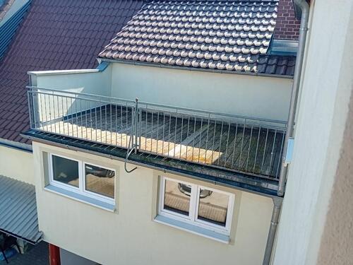 Foto - Einfamilienhaus mit großem Balkon und Kfz Stellplatz zu vermieten