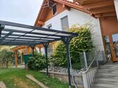 Foto - Einfamilienhaus mit Garten und Carport
