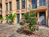 Foto - Sonnige, große 3 Zimmer Wohnung,Parterre in mediterranem Ambiente