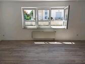 Foto - Gemütliche Souterrain - Wohnung mit Terrasse in ruhiger Lage 1Zi+