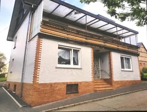 Foto - Biete rentables Ein,- Mehrfamilienhaus