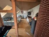 Foto - Helle 3-Zimmer-Altbauwohnung mit Schwedenofen im DG