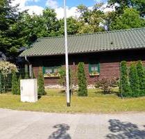 Blockbohlenhaus mit Wintergarten auf Eigentumsland am Wasser. - Grabowhöfe