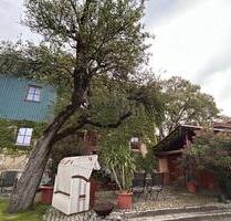 Tuffsteinhaus am Bach in Huglfing