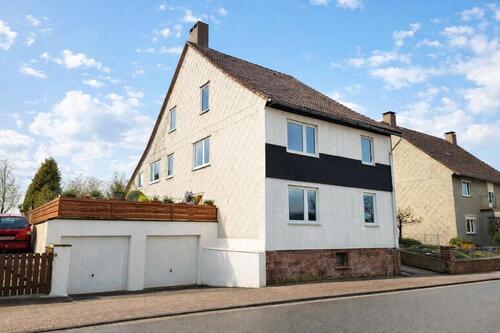 Foto - Wunderschöne Erdgeschoßwohnung mit Kamin Terrasse Garten Garage