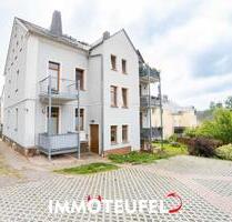 Großzügige 4-Zimmer-Dachgeschosswohnung mit Balkon, Stellplatz und Einbauküche in ruhiger Lage von Oelsnitz - Oelsnitz (Erzgebirge)