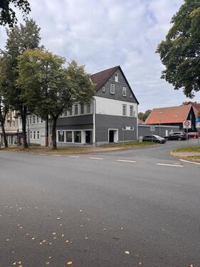 Foto - Mehrfamilienhaus mit Ladenfläche