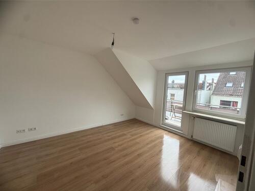 Foto - Helle Dachgeschosswohnung im Reihenhaus