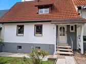 Foto - Einfamilienhaus mit Garten und Garage
